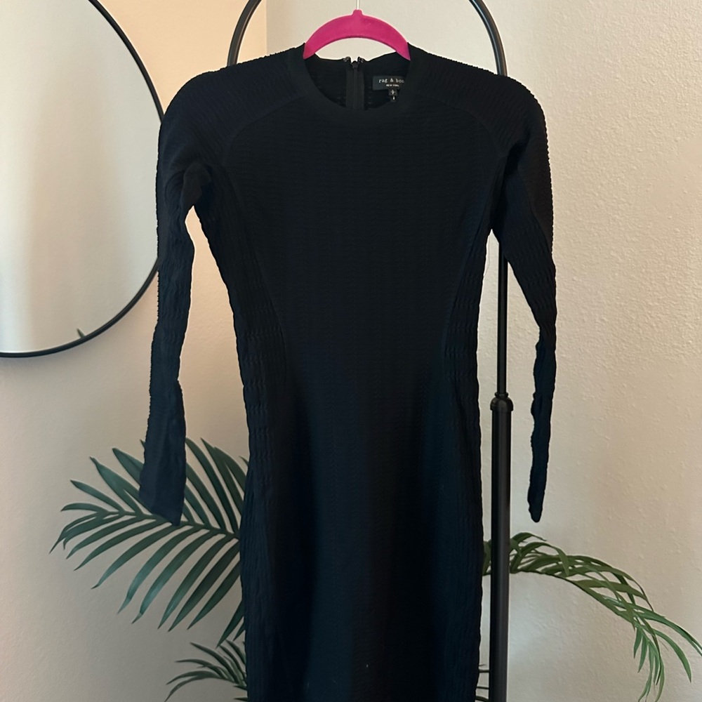 Little black dress. Fitted knee length.